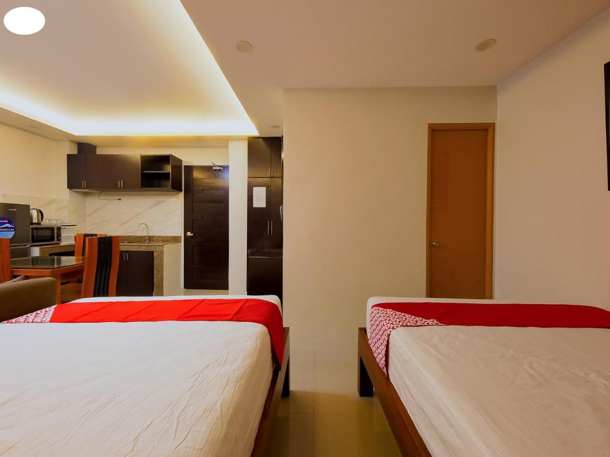 Oyo 848 Dona Aurora Condotel Quezon City Buitenkant foto